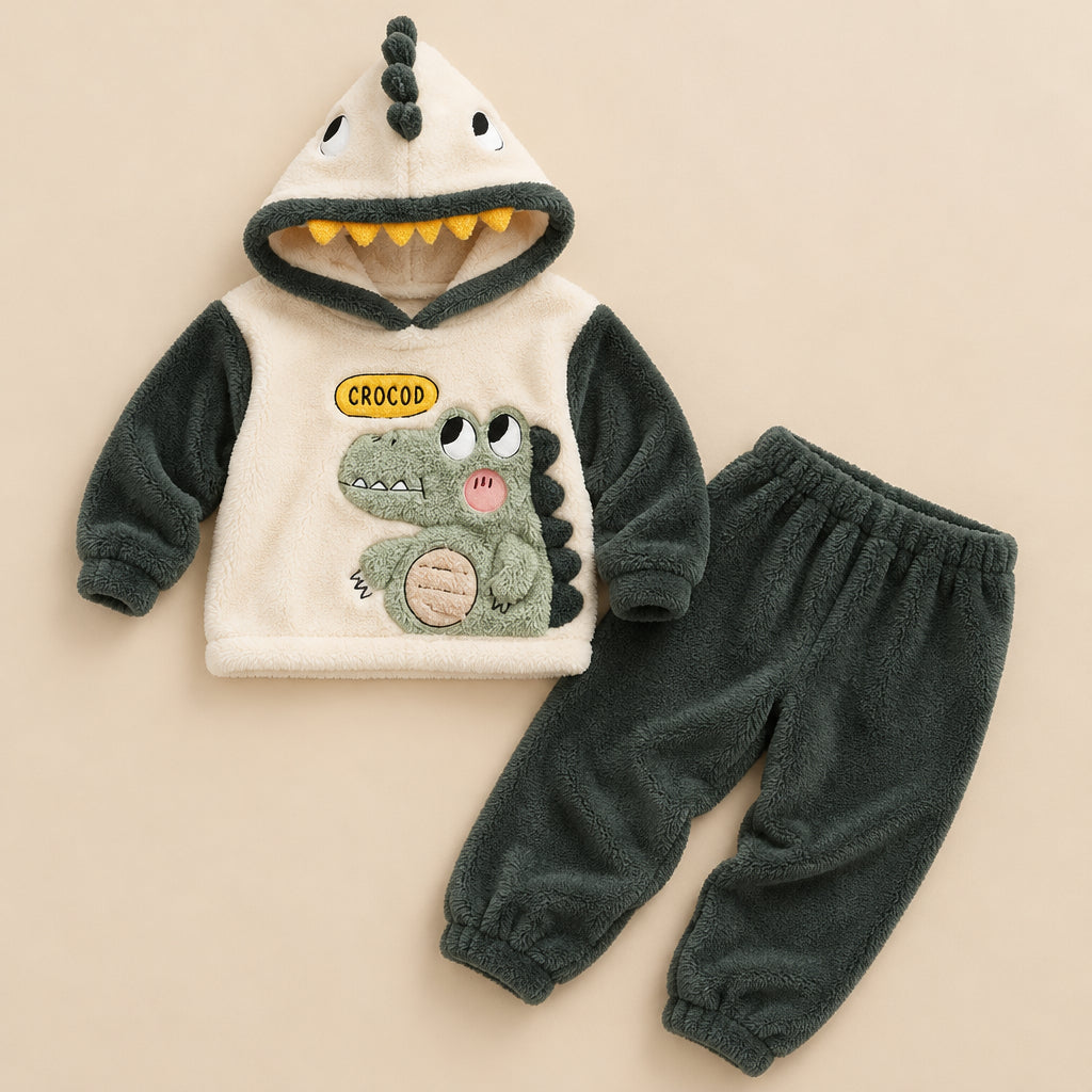 Ensemble pyjama deux pièces Pyjama pilou pilou dinosaure doux à capuche posé à plat sur fond beige, sans personne