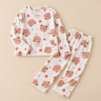 Ensemble pyjama deux pièces Pyjama moumoute femme et ado ours fleuri posé à plat sur fond beige, sans personne